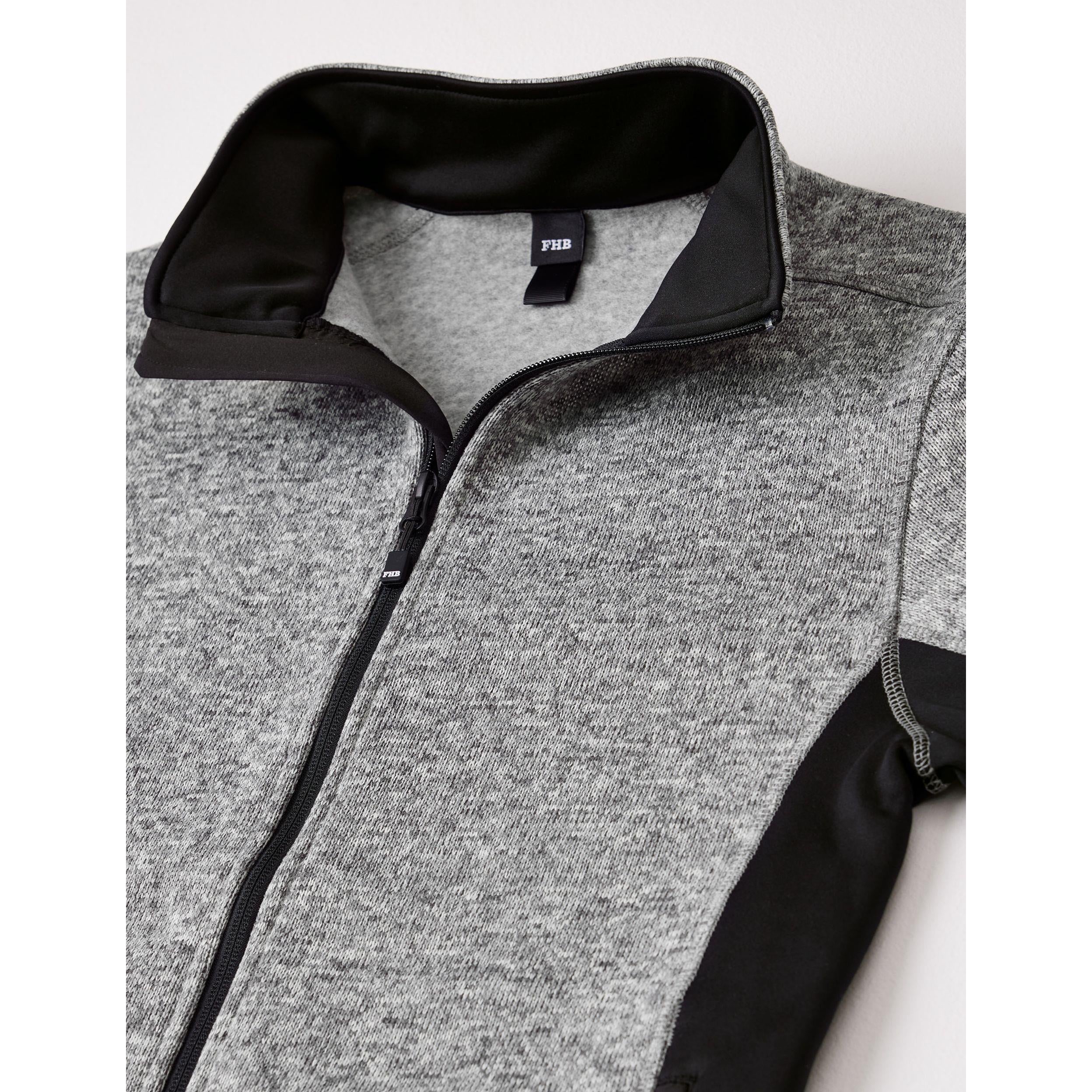 Detailaufnahme YKK-Reißverschluss der FHB Strick-Fleece-Jacke